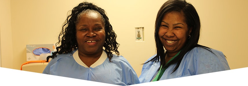 Two smiling nurses